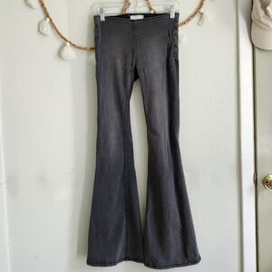 We The Free Faded Black Elastic Waist Flare Jeans